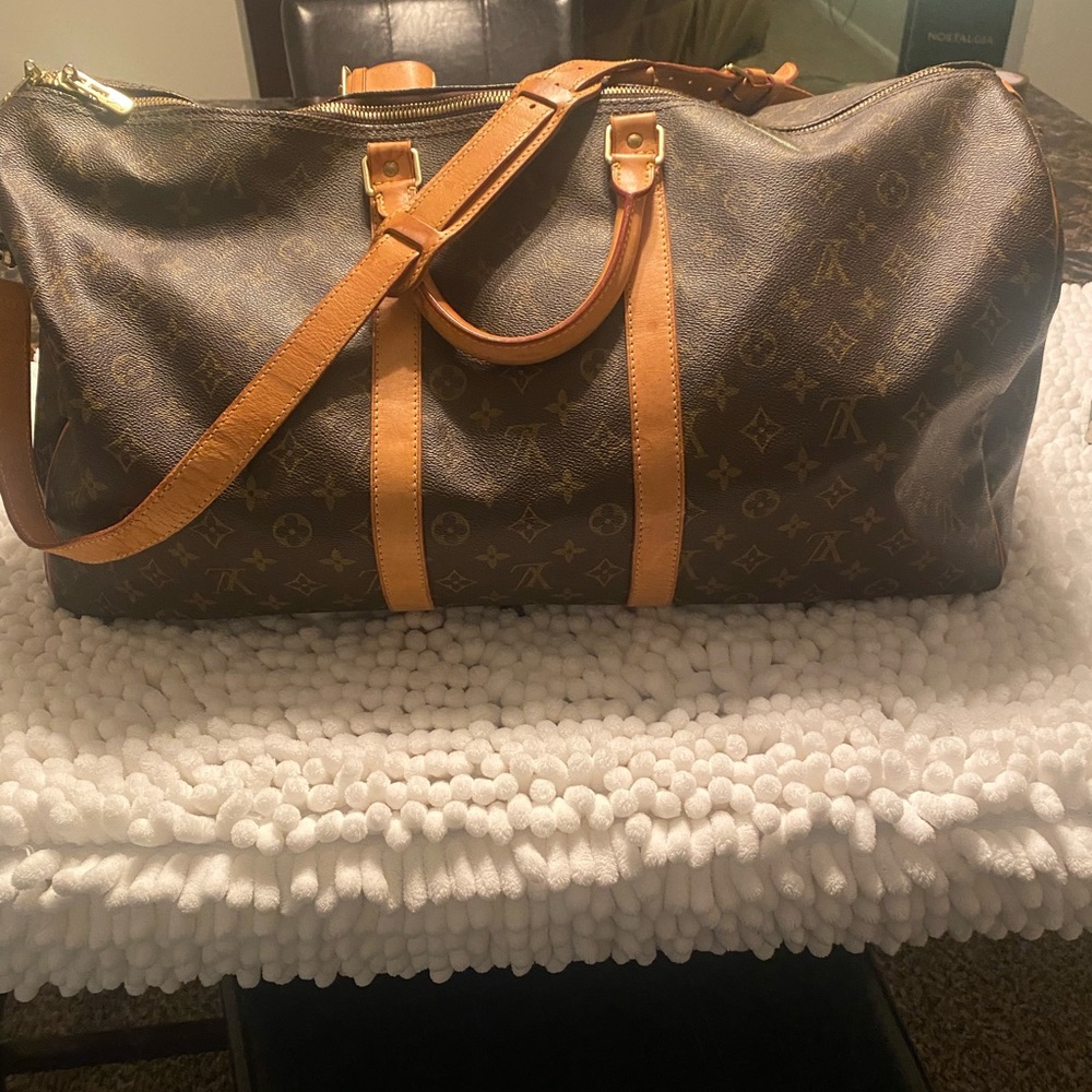 Louis Vuitton Bandoulie’re 55 vintage traveling bag
